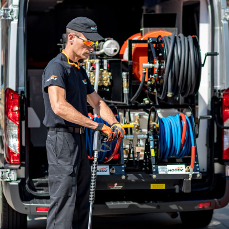 HOODZ technician getting ready for grease trap cleaning service