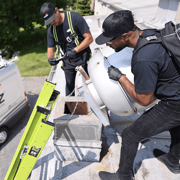 hoodz techs on roof